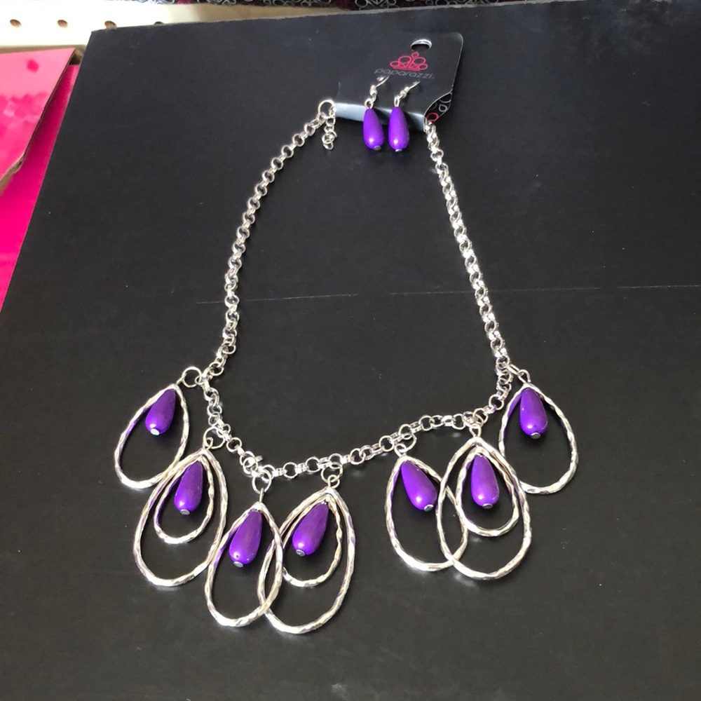 Piper and silver hoops necklace and with earrings.